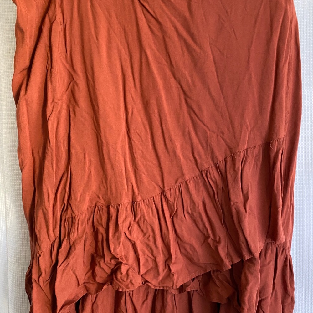 Hi-lo skirt with ruffled bottom. Burnt Orange.